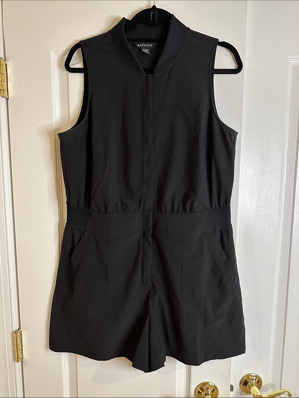 Athleta Black Sleeveless Zip-Front Romper with Waist Pockets
